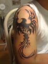 tribal phoenix arm tattoos